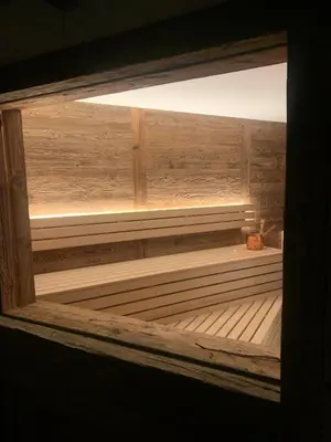 a wooden sauna with a light on top of it at Puent Seceda-Dolomiti-Val Gardena in Ortisei
