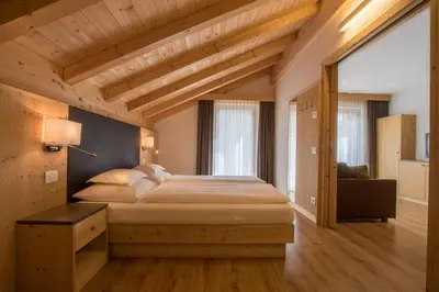 a bedroom with a large bed in a room at Apt Bel Pre in La Villa