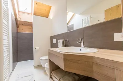 a bathroom with a sink and a toilet at Apt Bel Pre in La Villa