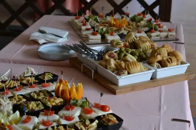 a table with many different types of food on it at Hotel Salgetti in Mezzano