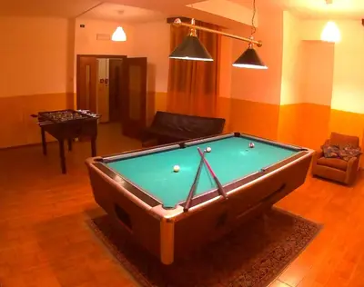 a living room with a pool table in it at Hotel Salgetti in Mezzano