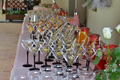 a bunch of wine glasses sitting on a table at Hotel Salgetti in Mezzano