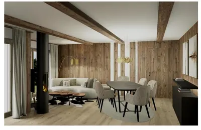 a living room with a couch and a table and chairs at Apartments Clivus in Corvara in Badia