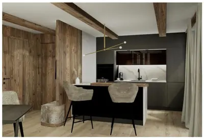 a kitchen with a island with bar stools in it at Apartments Clivus in Corvara in Badia