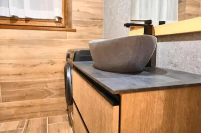 a chair sitting on top of a counter in a kitchen at Villa Antermont in Canazei