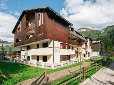 a building with snow in front of it at Apartment Apt 18 by Interhome in Campitello di Fassa
