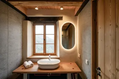 a bathroom with a sink and a window at OBERBUCHFELDER historic farmhouse in Laion