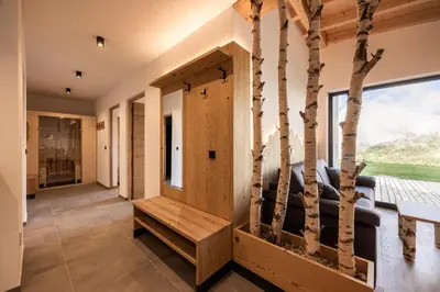 a sliding glass door in a room at Stabingerhof Chalets & Apartment-Farm stay in Bressanone