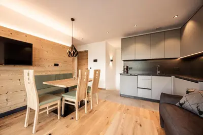 a close up of a black stove top oven at Stabingerhof Chalets & Apartment-Farm stay in Bressanone