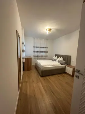 a large bedroom with a large bed in a room at Villa Hajdi Q & U in Merano