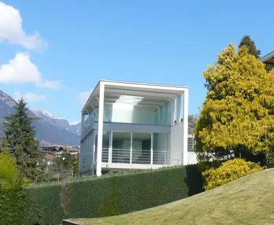 a white house on top of a hill at Villa Alvarium in Schenna