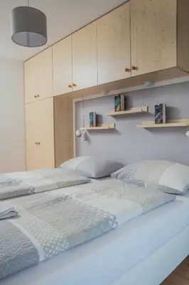 a room with a window and a book shelf at Apartment - Alpin Chalet Frenademetz in San Martino in Badia