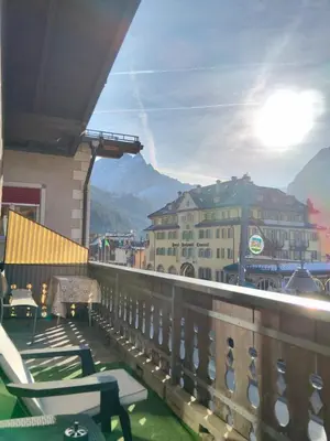 a balcony with chairs and a view of a mountain at Azalea in Canazei