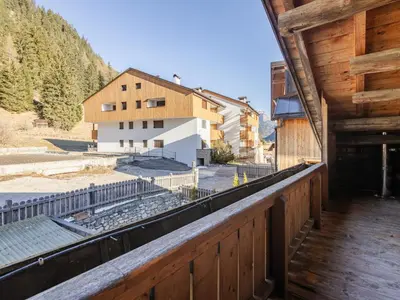 a view from the balcony of a building at Apartment Casa Costazzer B by Interhome in Mazzin