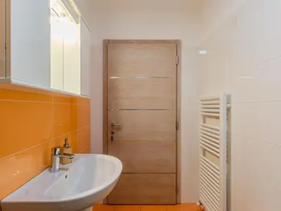 a bathroom with a sink and a mirror at Apartment Elisa by Interhome in Ronzone