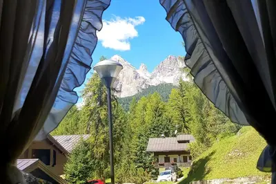 a view of a mountain from a window at APARTMENT - Ski in&out-accesso diretto alle piste in Cortina dʼAmpezzo