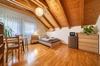 a living room with a couch and a table at FaWa Apartments 
