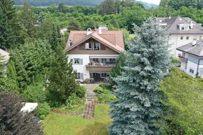 an aerial view of a house with a tree at FaWa Apartments 