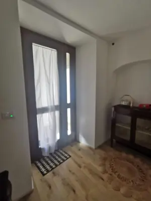 an empty room with a door and a window at Casa della Lavanda in Sarnonico