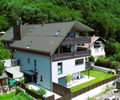 an aerial view of a house with a roof at Apartments LIANA in Postal