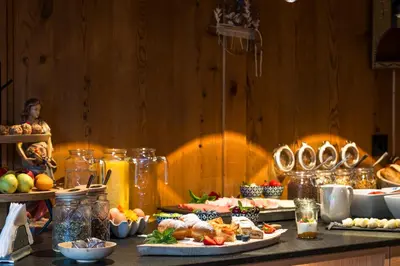 a buffet with many different types of food on a table at Sule Hof Agriturismo in Ortisei