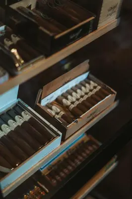 a row of boxes of chocolate on a shelf at Tirolensis - Luxury All Inclusive in Tesimo
