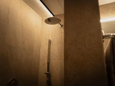 a shower in a bathroom with a shower at Gruberhof Lana - NEW! in Lana