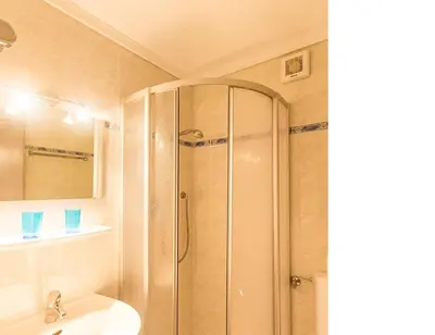 a bathroom with a shower and a sink at Apartements Mitterstill in Fiè