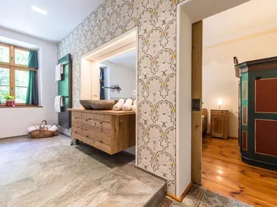 a bathroom with a sink and a mirror at Apartments Ansitz Wildberg in San Lorenzo di Sebato
