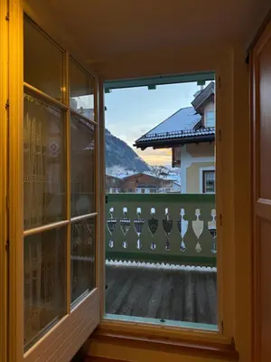 a view from a window of a balcony at Cèsa Emily in Campitello di Fassa