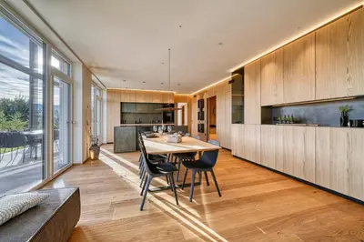 a kitchen and dining room with a table and chairs at HOMESTWENTY3 - Home six in Caldaro