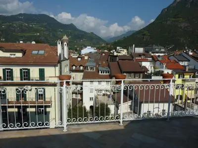 a view of a city from a balcony at Apartment Leonardo in Bolzano