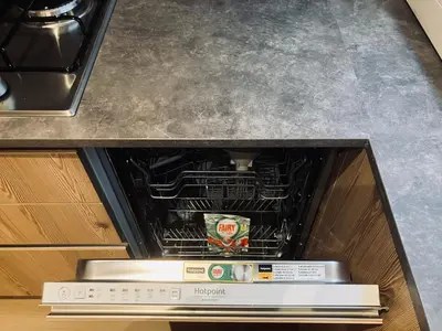 an oven with its door open in a kitchen at CERMIS Minisuite in Cavalese
