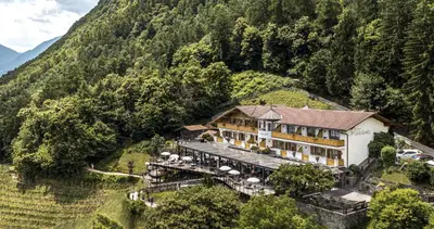 an aerial view of a hotel on a mountain at Hotel Restaurant Waldea in Marlengo