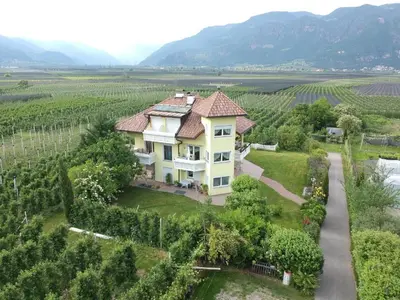 an aerial view of a house in a vineyard at FeWo 2 am Martinshof in Eppan im Süden Südtirols in Missiano