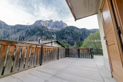 a balcony with a view of a mountain at Apartment with Sauna at Pineta Pastry in Sottoguda