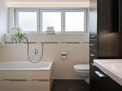 a bathroom with a toilet and a sink at Apartment Schmetterling in Collalbo