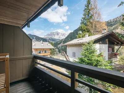 a balcony with a view of the mountains at Apartment Fontanelle-4 by Interhome in Alba di Canazei