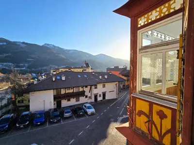 a view from a window of a street with parked cars at Casetta sui Monti - Alpine Stay Apartments in Tesero