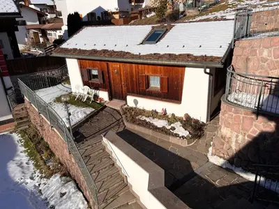 an overhead view of a house with a snow covered roof at Scurcia in Ortisei