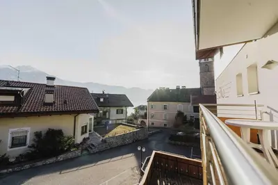 a view of a street from a balcony with buildings at Appartements Elke in Lagundo
