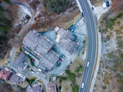 an overhead view of a house and a road at Suite Monte Pelsa in Alleghe