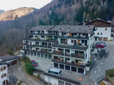 an aerial view of a building in the mountains at Suite Monte Pelsa in Alleghe
