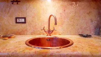 a sink in the middle of a counter in a bathroom at Elegante Attico a San Vito in San Vito di Cadore