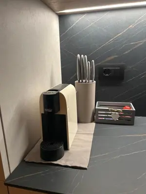a coffee maker sitting on top of a counter at Casa Franz in Tesero