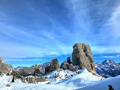 a rock formation on a snow covered mountain at Large Central Flat, 5min to Sky Slopes, Garage in Cortina dʼAmpezzo