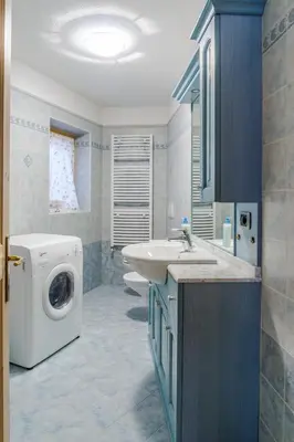 a bathroom with a shower and a toilet and a sink at Dolomites with Love in Mazzin