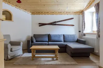 a bedroom with two bunk beds in a room at Dolomites with Love in Mazzin