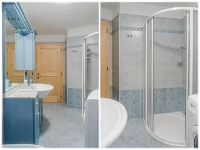 a bathroom with a shower and a toilet and a sink at Dolomites with Love in Mazzin