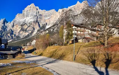 a mountain with a building on the side of a road at Lovely Apartment In San Vito Di Cadore in San Vito di Cadore